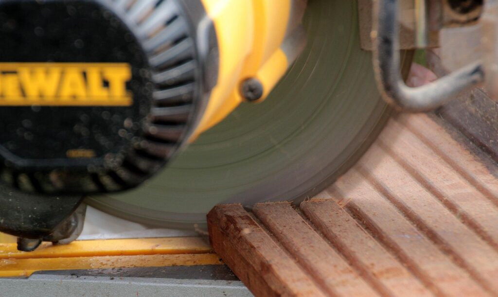 chop saw, handyman, operation of the saw, shortening wood, bangkirai, security protection, rotating saw blade, splinter, precautions, wooden board, outdoors, carpentry, chop saw, handyman, handyman, handyman, handyman, handyman, carpentry